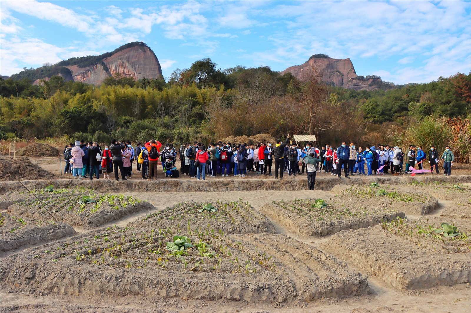 Field class beneath the Danxia mountains